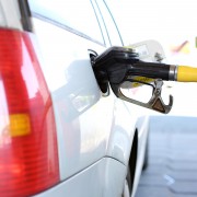 A picture of a car being filled up with fuel