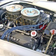 A picture of underneath a car bonnet