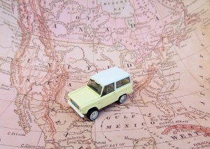 Image displays a toy car placed on a map 
